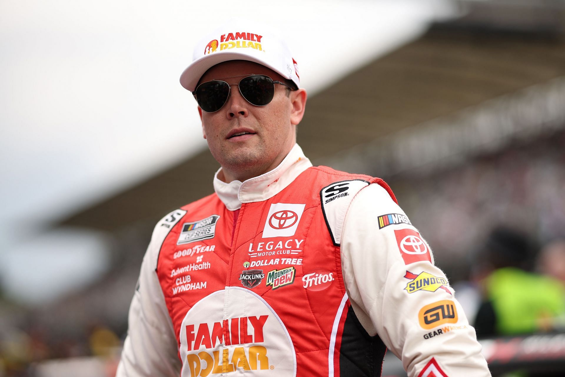 Erik Jones, driver of the #43 Family Dollar Toyota, looks on during pre-race ceremonies before the NASCAR Cup Series Viva Mexico 250 at Autódromo Hermanos Rodríguez on June 15, 2025- Source: Getty